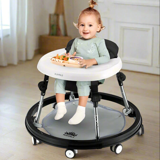 Child using a Playpills baby walker in a room with a shelf and toys.