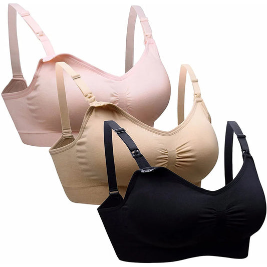 Three bras in pink, beige, and black on a white background